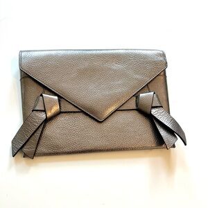 BCBGMaxAzria gunmetal silver pewter metallic tie-embellished envelope clutch bag